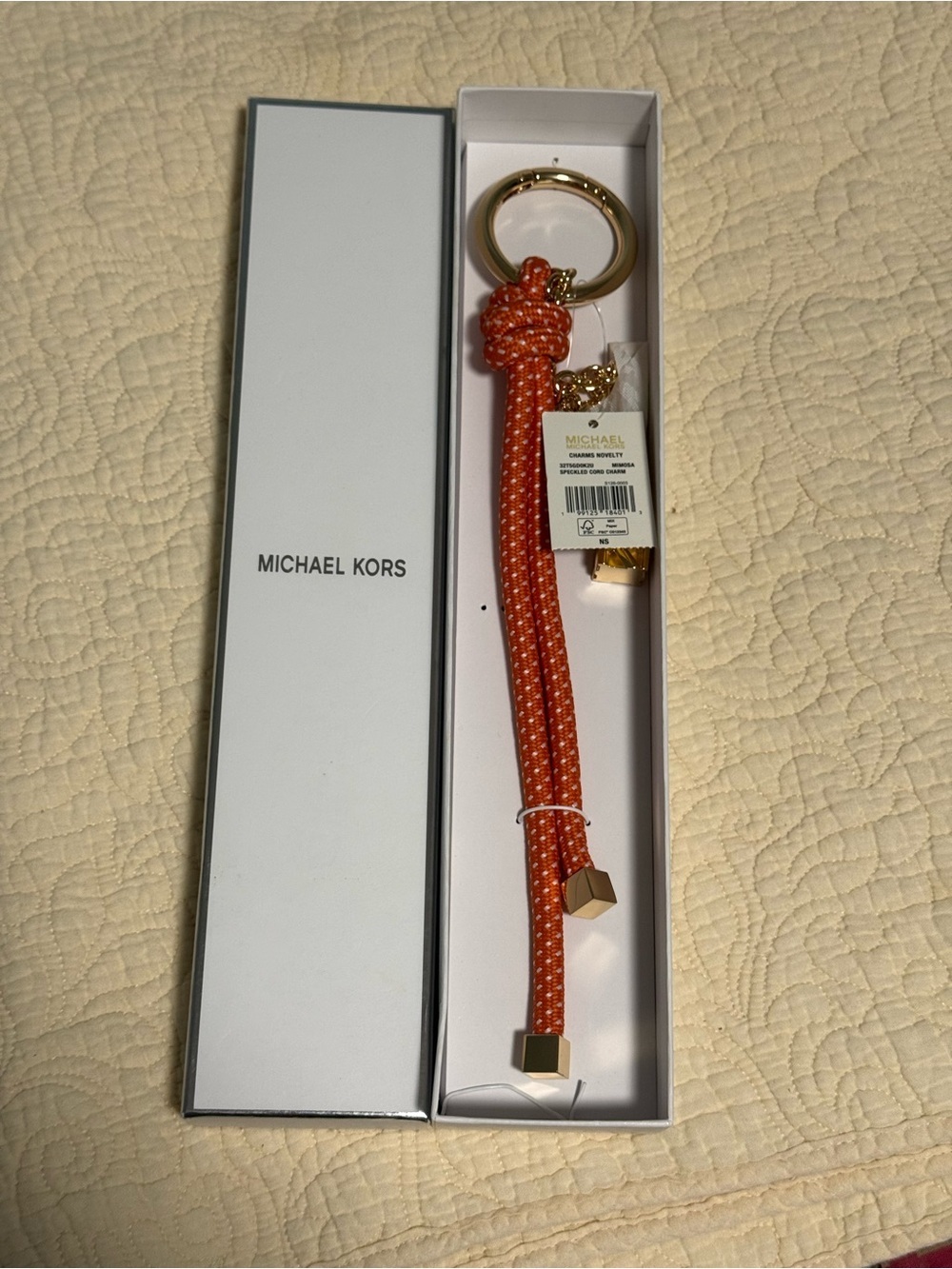 Michael Kors “Mimosa” orange Rope Bag Charm/Keychain with Gold Ring and MK charm